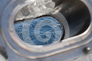 sea Ã¢â¬â¹Ã¢â¬â¹waves in the silver ship window